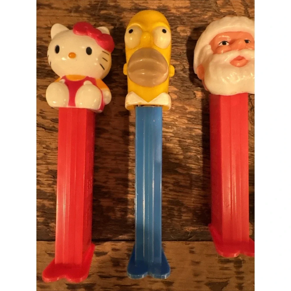 6 VINTAGE PEZ DISPENSERS Hello kitty, Homer Simpson, Santa, Etc